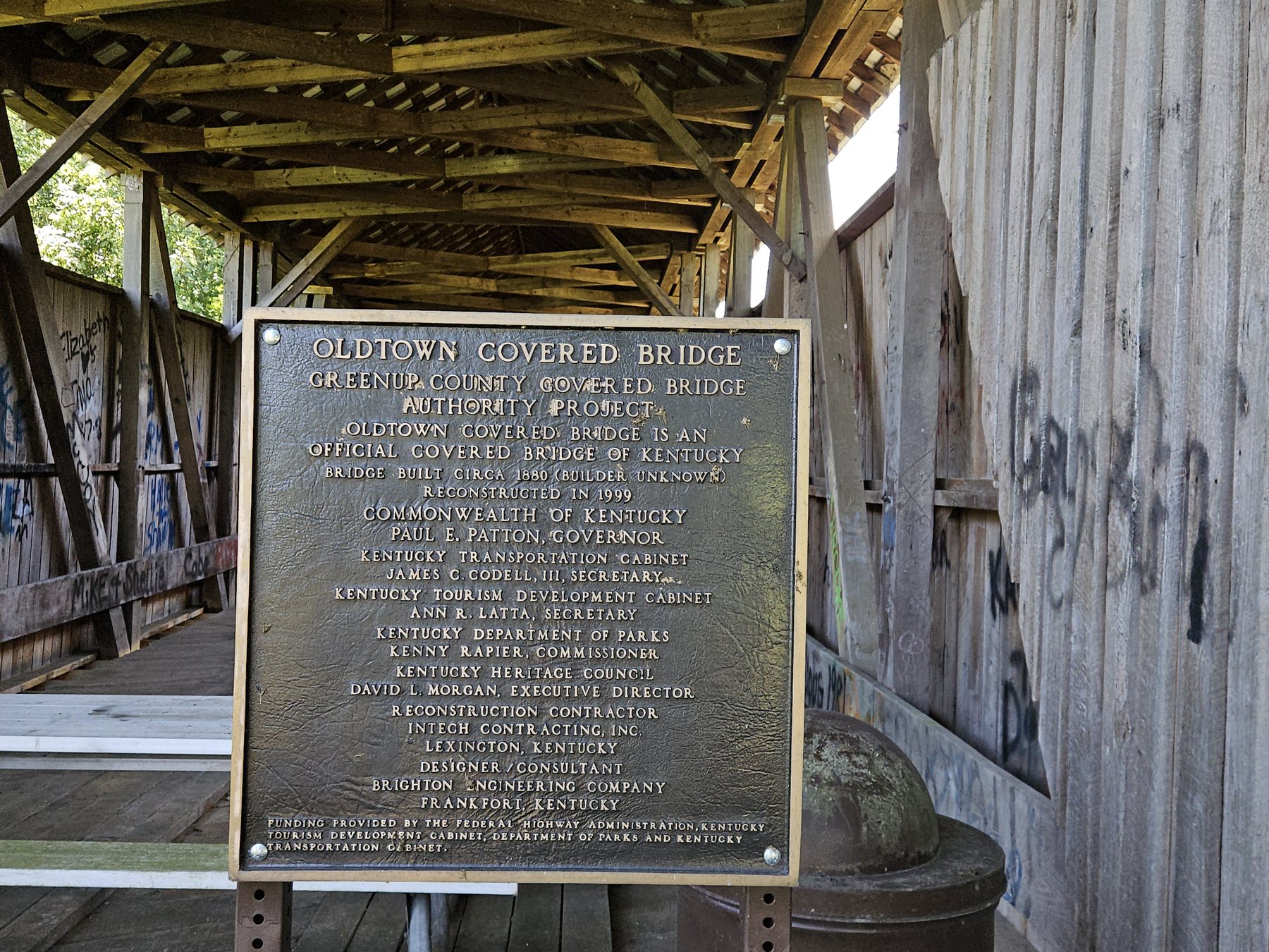 The Oldtown Covered Bridge marker inside the timber bridge