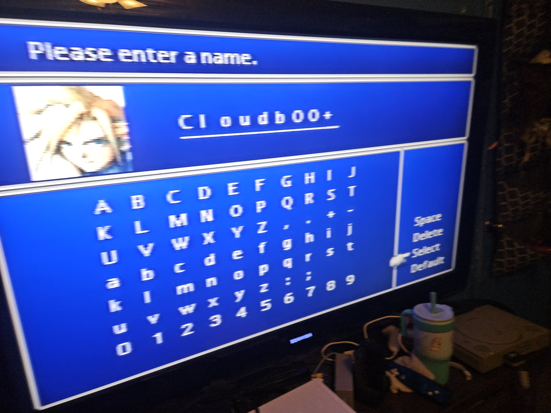 Final Fantasy VII character naming screen on a television